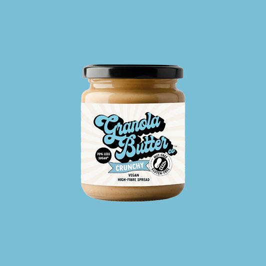 Jar of crunchy granola butter, the high fibre spread with a blue logo and nut free and gluten free icon visible on the recyclable packaging.  